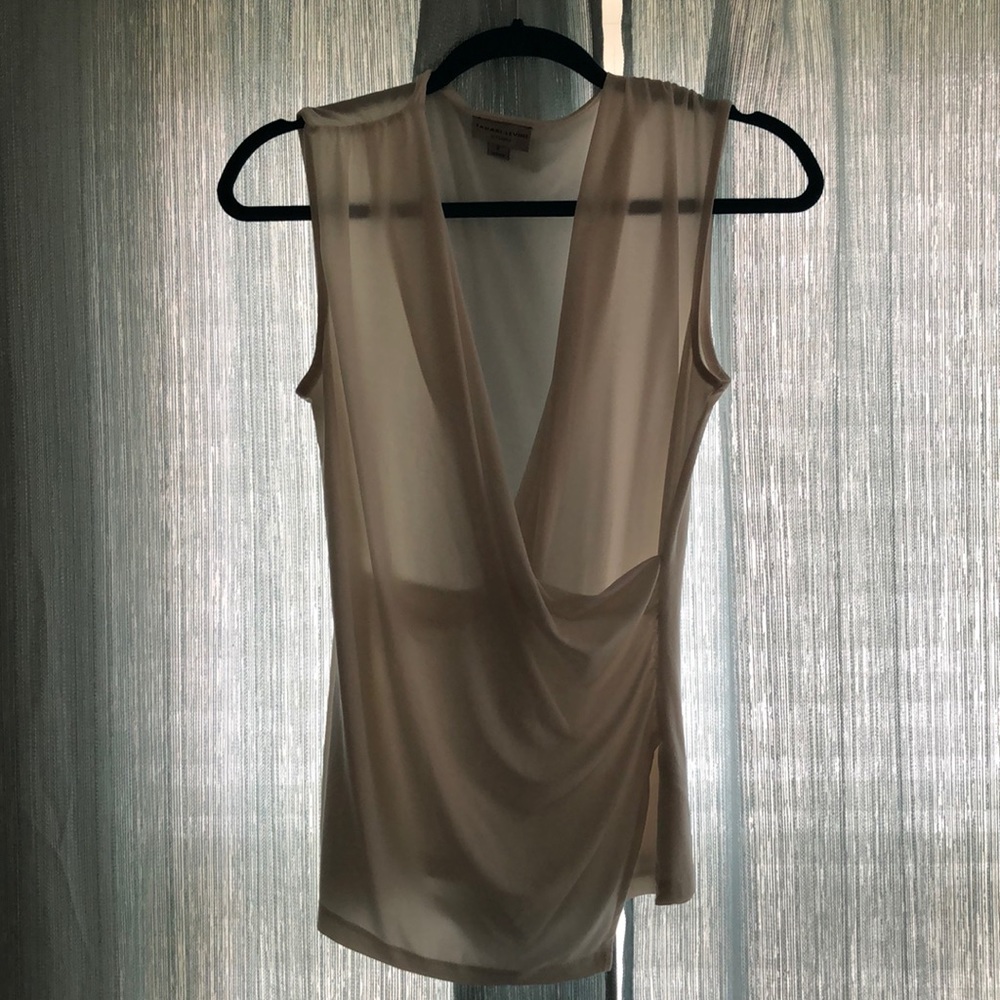 White sleeveless blouse